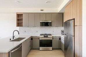 Fridge, microwave, oven, dishwasher