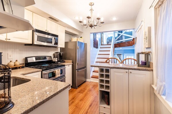 Fridge, microwave, dishwasher, coffee/tea maker