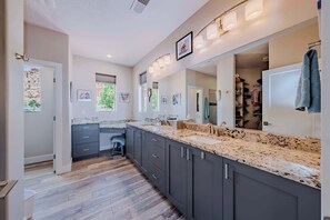 Shower, hair dryer, towels, shampoo