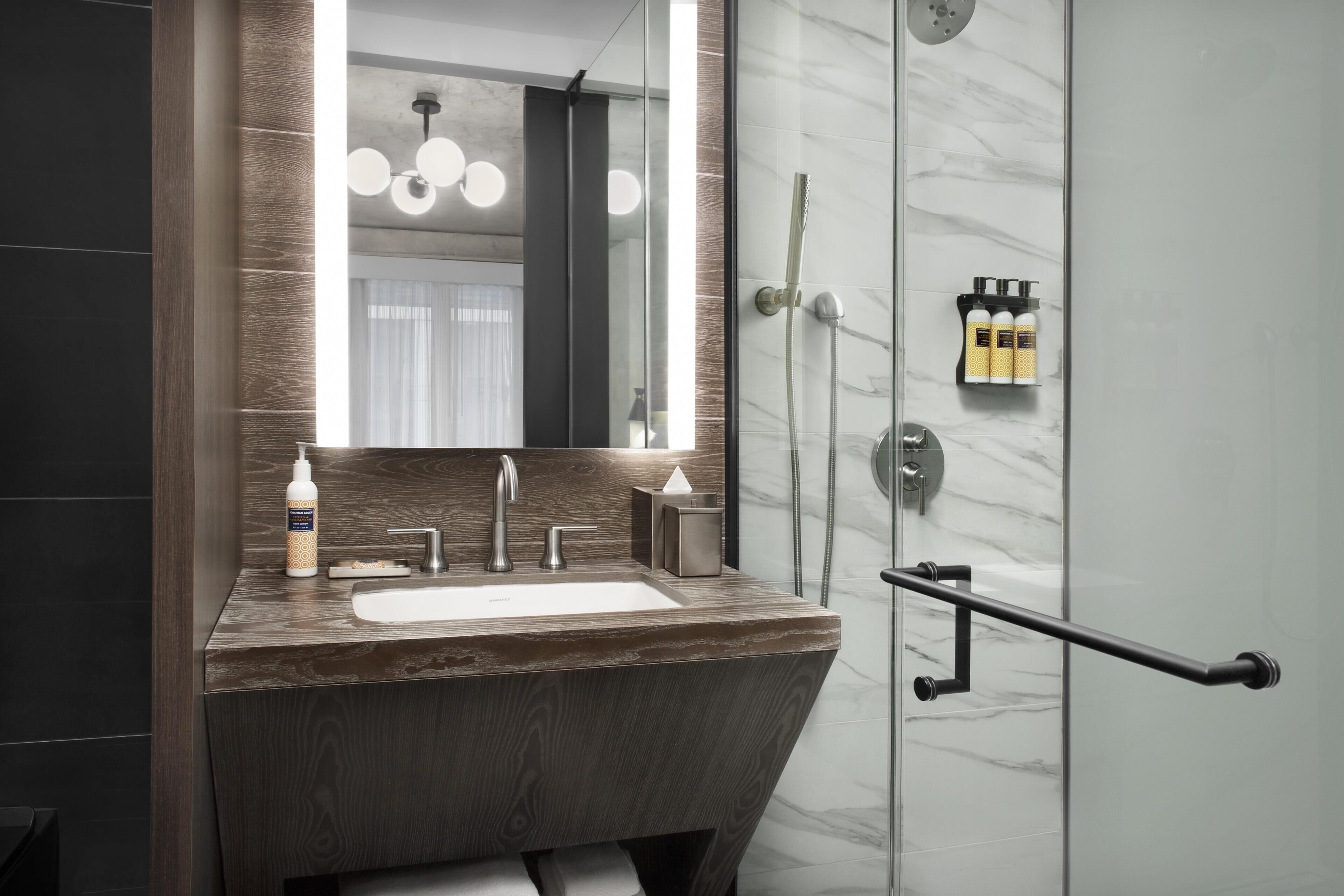 Shower, rainfall showerhead, eco-friendly toiletries, hair dryer