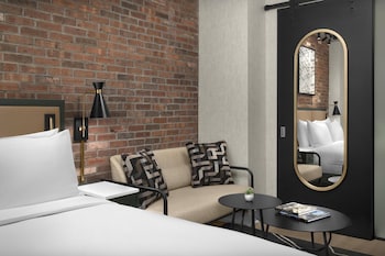 Deluxe Room, 1 King Bed | Premium bedding, in-room safe, desk, laptop workspace at The Livingston, part of JdV by Hyatt
