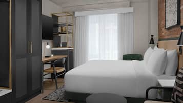 Deluxe kamer, 1 kingsize bed | Luxe beddengoed, een kluis op de kamer, een bureau, een laptopwerkplek