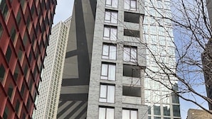 The exterior of the Livingston Hotel with a modern facade, large windows, and a prominent entrance. - The Livingston, part of JdV by Hyatt (Brooklyn)