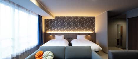 Deluxe Twin Room | In-room safe, individually furnished, blackout drapes