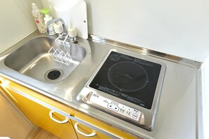 Fridge, microwave, cookware/dishes/utensils