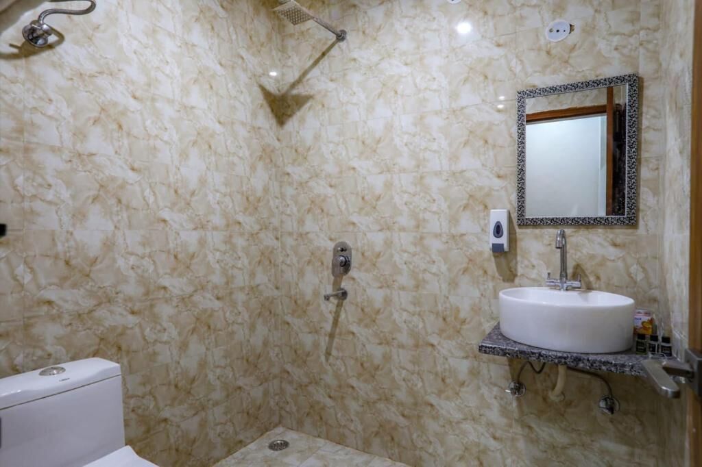 Shower, towels, soap, shampoo