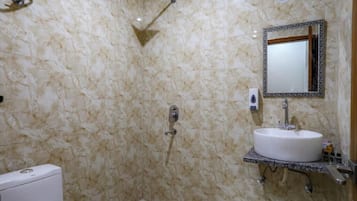 Shower, towels, soap, shampoo