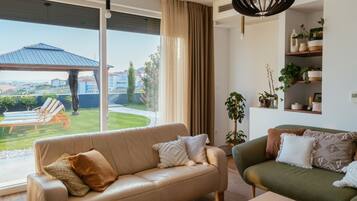 Villa (Five Bedroom House) | Living room | 32-inch flat-screen TV with cable channels, ping pong