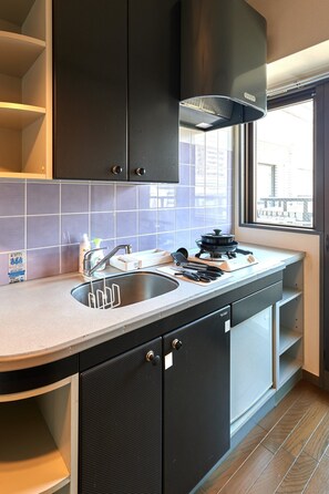 Fridge, microwave, cookware/dishes/utensils