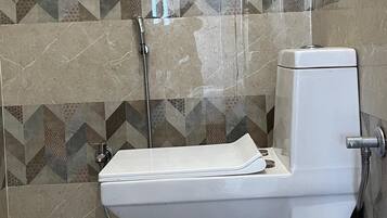 Shower, bidet, towels, soap