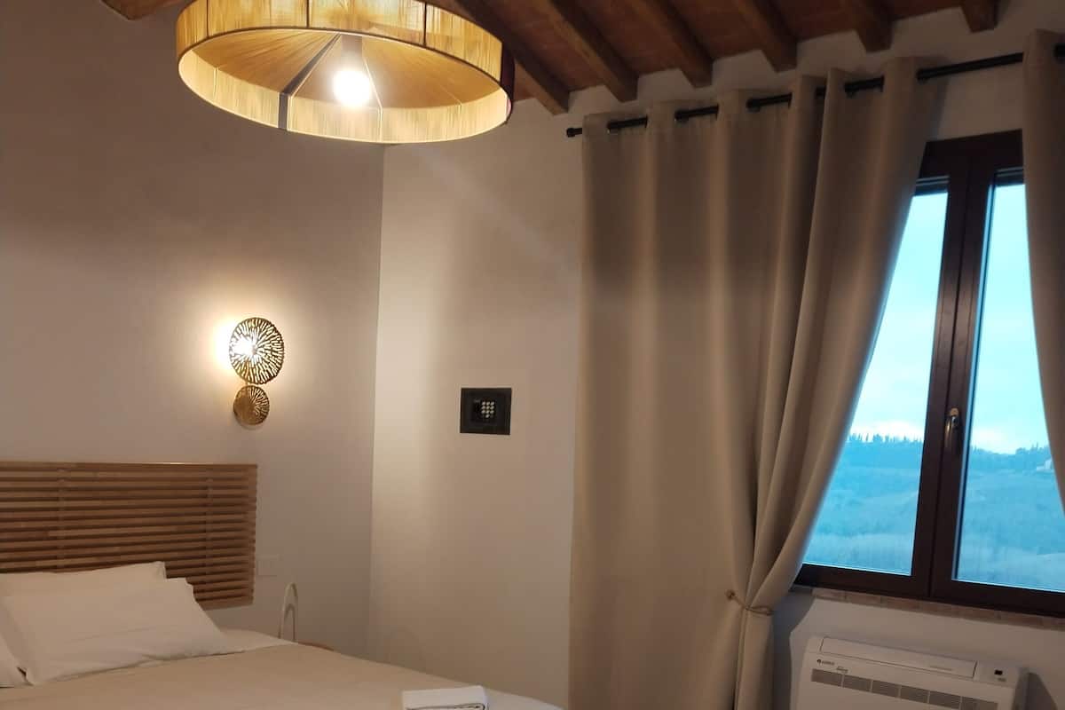 Comfort Apartment, 2 Bedrooms, Balcony, Hill View | In-room safe, blackout drapes, iron/ironing board, free WiFi