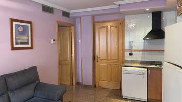Full-size fridge, microwave, stovetop, dishwasher