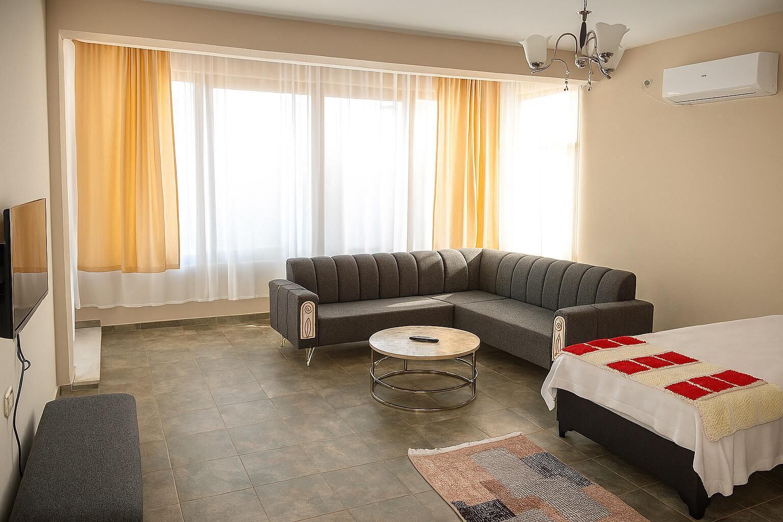 Estudio familiar, balcón, vista al mar | Área de sala de estar