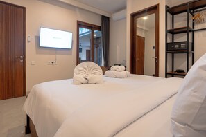 Deluxe Double Room, Pool View | In-room safe, desk, laptop workspace, free WiFi
