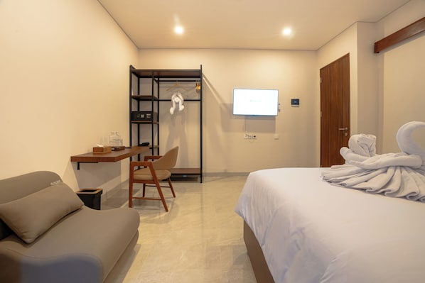 Suite, Pool View | In-room safe, desk, laptop workspace, free WiFi