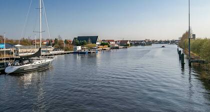 Nice holiday home on the water in Grou