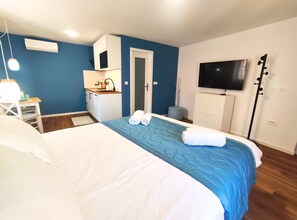 1 chambre, fer et planche à repasser, Wi-Fi gratuit, draps fournis