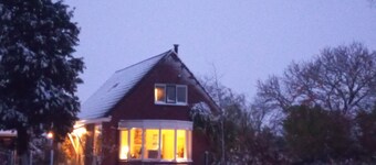 Bright and comfortable house, large fenced yard, toys, hiking, wood stove!