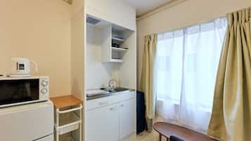 Fridge, microwave, cookware/dishes/utensils