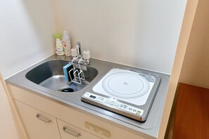 Fridge, microwave, cookware/dishes/utensils