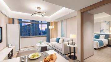 Deluxe Apartment, 1 Bedroom | Down comforters, desk, blackout drapes, iron/ironing board