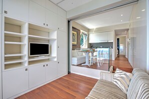 Standard Apartment, Multiple Bedrooms, 2 Bathrooms, Sea Facing (Il Faro Sul Mare - Total Sea View) | Living area | 21-inch flat-screen TV with satellite channels - Il Faro Sul Mare - Total Sea View (Andora)