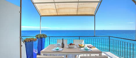 Standard Apartment, Multiple Bedrooms, 2 Bathrooms, Sea Facing (Il Faro Sul Mare - Total Sea View) | Outdoor dining