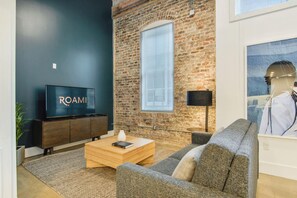 TV, offices - Roami at Motorworks | 2-Story | 1BR Superdome (New Orleans)