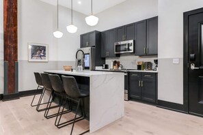 Fridge, dishwasher, coffee/tea maker, toaster