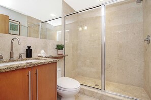 Shower, hair dryer, towels