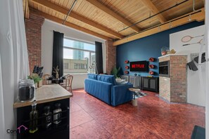 Smart TV, fireplace, books, offices