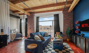 Smart TV, fireplace, books, offices