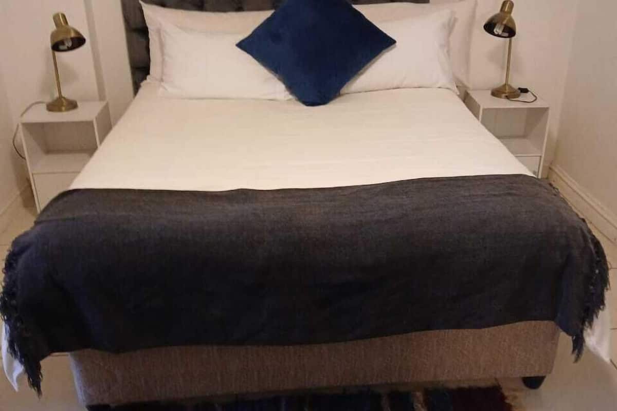 Apartment, Balcony, Garden View | In-room safe, iron/ironing board, free WiFi