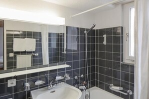 Hair dryer, towels, soap, shampoo