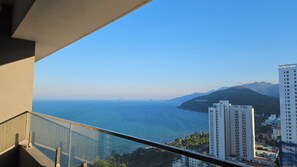 Family Apartment, Balcony, Beach View | Individually furnished, blackout curtains, iron/ironing board, free WiFi