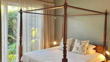 1 bedroom, desk, iron/ironing board, travel crib