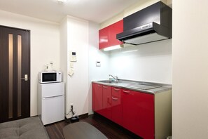 Fridge, microwave, cookware/dishes/utensils