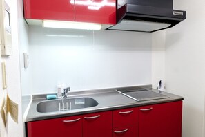 Fridge, microwave, cookware/dishes/utensils