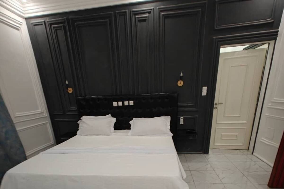 Senior Double Room | Desk, blackout curtains, iron/ironing board, free WiFi