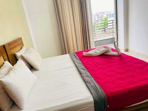 In-room safe, desk, laptop workspace, soundproofing - Opo Ministar Hotel (Gurugram)