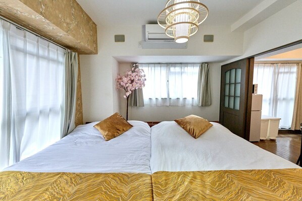 2 chambres, fer et planche à repasser, accès à Internet