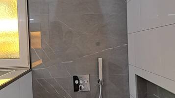 Jetted bath, hair dryer, towels, soap