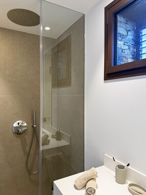 Shower, hair dryer, towels, soap