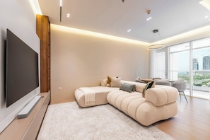 Appartement Luxe, vue ville | Coin séjour | Jouets