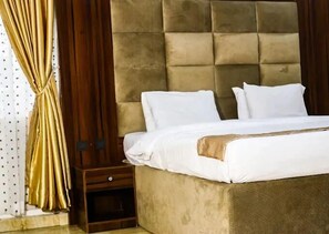 Deluxe Room, Balcony, City View | Desk, laptop workspace, blackout drapes, soundproofing