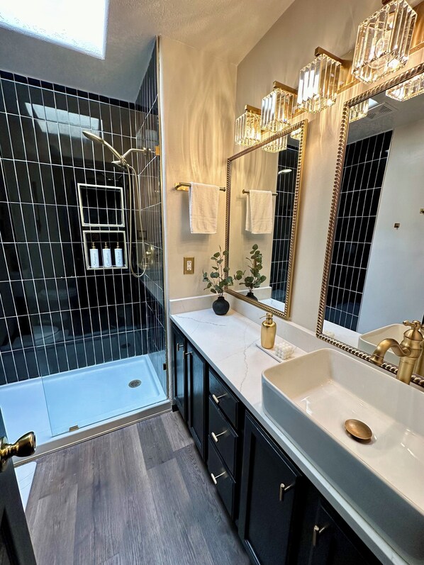 Shower, hair dryer, towels, soap