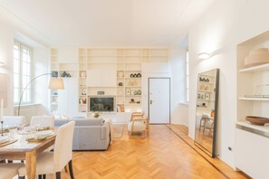 Apartment (2 Bedrooms) | Living area | 32-inch flat-screen TV with satellite channels, Netflix - Casa Odescalchi by Rent all Como (Como)