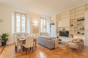 Apartment (2 Bedrooms) | Living area | 32-inch flat-screen TV with satellite channels, Netflix - Casa Odescalchi by Rent all Como (Como)