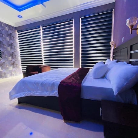 Deluxe Room, Balcony, City View | Desk, laptop workspace, free WiFi