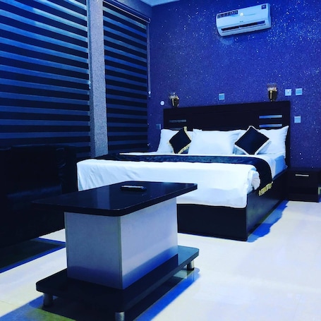 Deluxe Room, Balcony, City View | Desk, laptop workspace, free WiFi